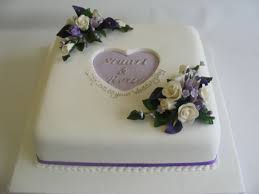 1 Tier Black And Gold Square Cake Single Tier Square Cake With Lilac And Purple Detail And Sugar Flowers Square Wedding Cakes Simple Square Wedding Cakes Wedding Anniversary Cakes