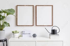 Unsurprisingly, they seamlessly mesh with the photograph and are perfect for simple interior designs that don't need a dramatic wall piece. Minimalistic Home Decor Of Interior With Two Brown Wooden Mock Stock Photo Picture And Royalty Free Image Image 119077030