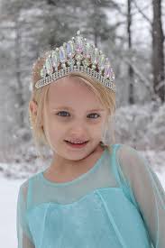 How can I improve my photography skills, specifically with photos of my  daughter in the snow?