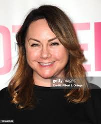 Kacey Fifield poses with her mother Barbara Fifield at a luncheon in...  News Photo