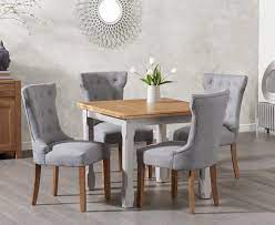 And, there's something to suit all space sizes with compact dining room sets and extending dining tables too. The Somerset 90cm Flip Top Oak And Grey Dining Table With Camille Grey Fabric Chairs Extends To Seat 8 With An Oak Edged Top With Veneer Inserts The Somerset Is Finished In Clear