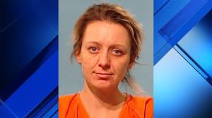 Woman whose children found with meth in system charged, police say
