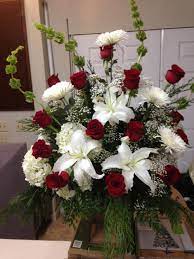 Fresh Church Arrangement Using Bells Of Ireland White Lilies White Hydran Winter Flower Arrangements Fresh Flowers Arrangements Christmas Floral Arrangements
