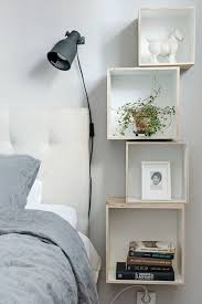 Use a floating corner shelf to create more space for your bedroom nightstand. Ahnliches Foto Small Space Storage Bedroom Diy Bedroom Storage Small Space Bedroom