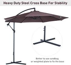 The pole stands on the side of the parasol, which allows you to position the shade wherever you need it, without having the poll stand in your way. Outsunny 3 M Garden Parasol Sun Shade Patio Banana Hanging Rattan Umbrella Cantilever Set Coffee