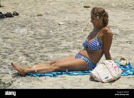 Mature British Lady Sunbathing At The Beach At Alappuzha In Kerala India Stock Photo Alamy