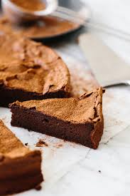Rich, fluffy and so tasty! Flourless Chocolate Cake No Refined Sugar Downshiftology