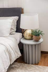 These free and easy diy nightstand plans show you exactly how to build a nightstand with a drawer and slide out tabletop extension. See What We Used To Create This Copycat Ribbed Side Table Hunker Side Tables Bedroom Diy Side Table Side Table Decor
