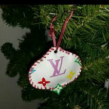 Each year, the shop's façade is decorated for christmas. Louis Vuitton Other 5 Pieces Louis Vuitton Christmas Tree Ornament Poshmark