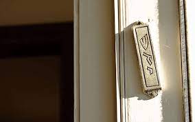 This post is done in conjunction with the mezuzah giveaway from turtle lane pottery. How To Hang The Mezuzah
