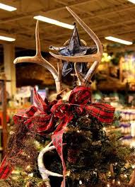 Anthropologie tassle ferris wheel tree topper ($42): Christmas Tree Topper Ideas