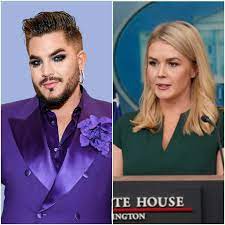 Sit down, Barbie.” — **Adam Lambert** suddenly calls Karoline Leavitt a  “T.r.u.m.p puppet” live on air — and just minutes later, she tries to  strike back, only to be met with a