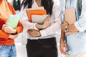 Group Of Students Holding Notebooks Group Of Students Student Apartment Interior Design
