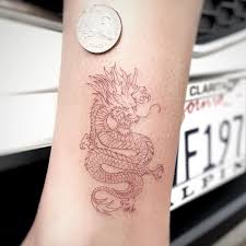 Black And Red Dragon Tattoo Designs Gloria Zhang Tattoo On Instagram Tiny Dark Red Line Work Dragon Ink Love Cute Tiny Tinyta Red Dragon Tattoo Dragon Tattoo For Women Small Dragon Tattoos