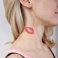 Everything You Need To Know About Kiss Tattoos Red Lips Tattoo Neck Tattoo Kiss Tattoo On Neck