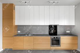 We did not find results for: Grey Kitchen With Wooden Cabinets Granite Worktop And White Cupboards Stock Photo Picture And Royalty Free Image Image 75442441