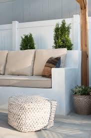 It's possible to get creative with concrete walls and add on features such as this wood bench seat. Custom Outdoor Seating Diy Room For Tuesday Blog