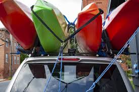 To release the strap, press the release tab and open the ratchet. How To Haul A Kayak A Practical Guide To Kayak Transport