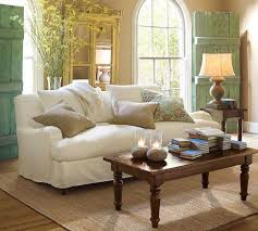 Almost any house wife can hit the thrift store, buy a can of paint, and voila, another lightly distressed. Love The Weathered Doors Shutters As Accent Pieces Home Cottage Living Rooms Home Living Room