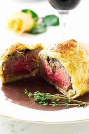 Mini Beef Wellingtons With Cabernet Sauce Beef Tenderloin Slices Mushrooms Herbs And Blue Cheese Are Enclosed With Mini Beef Wellington Beef Wellington Beef
