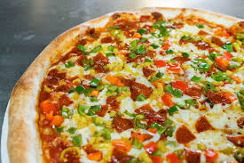 Dewey S Releases A Sgt Peppers Pizza As Tribute To The Beatles Album Cincinnati Magazine Cincinnati Magazine Stuffed Peppers Peppers Pizza Sgt Pepper