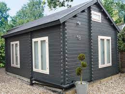 Maybe you would like to learn more about one of these? Love The Dark Brown Grey Colored Wood And The White Windows Considering This For The Log Sided House Garden Cabins Log Cabin Exterior Cabin Exterior