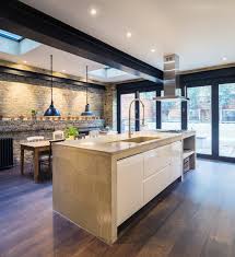 Dark brown hardwood floors in particular never seem to go out of fashion, they are always trendy and still in style. Magnificent London Looking For Flexible Contemporary Kitchen Exposed Brick Wall Dark Wood Kitchen Floor Industrial Wooden Dining Table Large Island Folding Doors