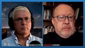 Men found clinging to life jacket, bucket and petrol can after boat  capsizes