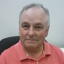 Firefighter Colin McShane of Engine 92 carries