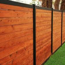 Installing fence posts is a critical component that's responsible for keeping your enclosure upright and straight. Best Wood Fences Lake Norman Fence Co Cornelius Nc
