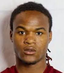 Suspect charged with killing police officer enters not guilty plea