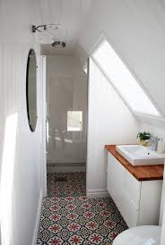 Bathroom Under Steeply Sloped Attic Roof Listed In Fantastic Lighting For Angled Ceiling Ideas F Small Attic Bathroom Upstairs Bathrooms Small Bathroom Tiles