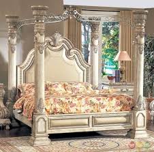 The bed features detailed carvings, acanthus leaf accents and gold accents which add a decorative touch to the traditional design. Victorian Inspired Antique White Luxury California King Poster Canopy Bed Canopy Bedroom Sets King Bedroom Sets Luxurious Bedrooms
