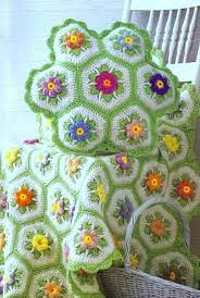 Put hexagons or pentagons together for a lovely afghan. Vintage Crochet Pattern Granny Floral Hexagon African Flower Etsy Crochet African Flowers Crochet Hexagon Crochet Blanket Patterns