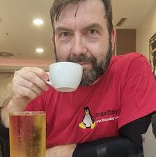 Best side for plucking bass guitar strings?