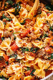 Tomato Spinach Sausage Pasta Recipe How To Cook Sausage Pasta Sausage Spinach Pasta Pasta Dinner Recipes Canned Tomato Recipes