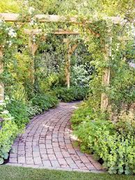 This tool is by far the fussiest garden tool to sharpen. Curved Pergola Trellis Around A Brick Garden Path Rustic Pergola Pergola Garden Garden Spaces