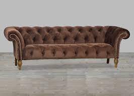 Handsome and chic, the cotton velvet sofa includes a greek key motif nailhead. Upholstered Brown Velvet Nail Head Sofa With Tufted