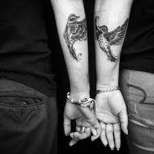 40 Unique And Matching Couple Tattoo Designs Outfitcafe Tattoos For Guys Matching Couple Tattoos Couple Tattoos