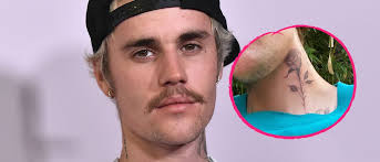 Sie teilte ein video ihrer hochzeit mit ihrem julian. Hals Ruiniert Fans Entsetzt Von Justin Biebers Tattoo Promiflash De