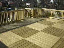 Checkered Decking In Pressure Treated Lumber Quaker State Construction Floating Deck Deck Builders Outdoor Space