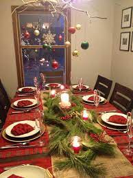 You won't believe what a difference a fir branch and holiday ribbon can make. Christmas Dinner Table Decorations Christmas Table Christmas Dinner Table Christmas Table Decorations