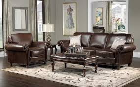 Leather furniture provides a classic look and feel, as well as a durable texture that often improves with age. Living Room Decorating Ideas Dark Brown Leather Sofa Dark Furniture Grey Walls Oduprise Me