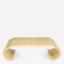 A glass coffee table, while beautiful, may not be the best choice for this room. Baker Furniture Company Lacquered Coffee Table By Alessandro For Baker