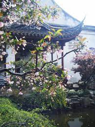 A Typical Chinese Garden Is Surrounded By Walls And Several Ponds Functioning Stones Trees And Flowers And Vario Chinese Garden Asian Garden Japanese Garden