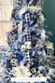 How To Add Ribbon To Decorate A Beautiful Blue Flocked Christmas Tree Here i'll give instructions step by step on how to decorate a christmas tree like a pro including some tricks and tips to help you out along the way. blue flocked christmas tree