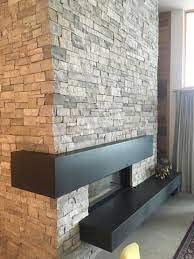 Limestone is available in many neutral colors to coordinate with a variety of home although not a natural stone, porcelain is now being manufactured in large slabs that can be used to dress shower walls and fireplace surrounds. Stone Fireplace Surround Bedrock Natural Stone