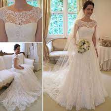 Long sleeve lace wedding dresses look fantastic with open shoulders. Long A Line Round Neck Illusion White Lace Wedding Party Dresses Wd0044 Lace Wedding Dress Vintage Wedding Dresses Lace Cap Sleeve Wedding Dress Lace
