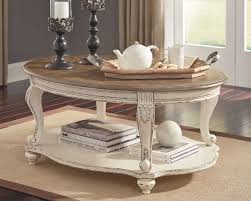 Realyn Coffee Table White Brown In 2020 White Distressed Coffee Table Coffee Table Farmhouse Distressed Coffee Table