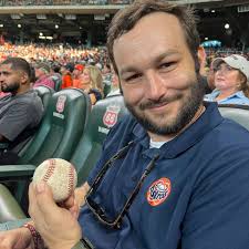 What is the piece of memorabilia in this baseball card called?